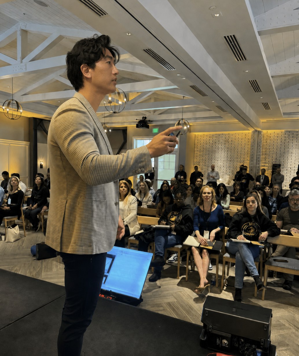 Jake Song teaching a seminar to a full room