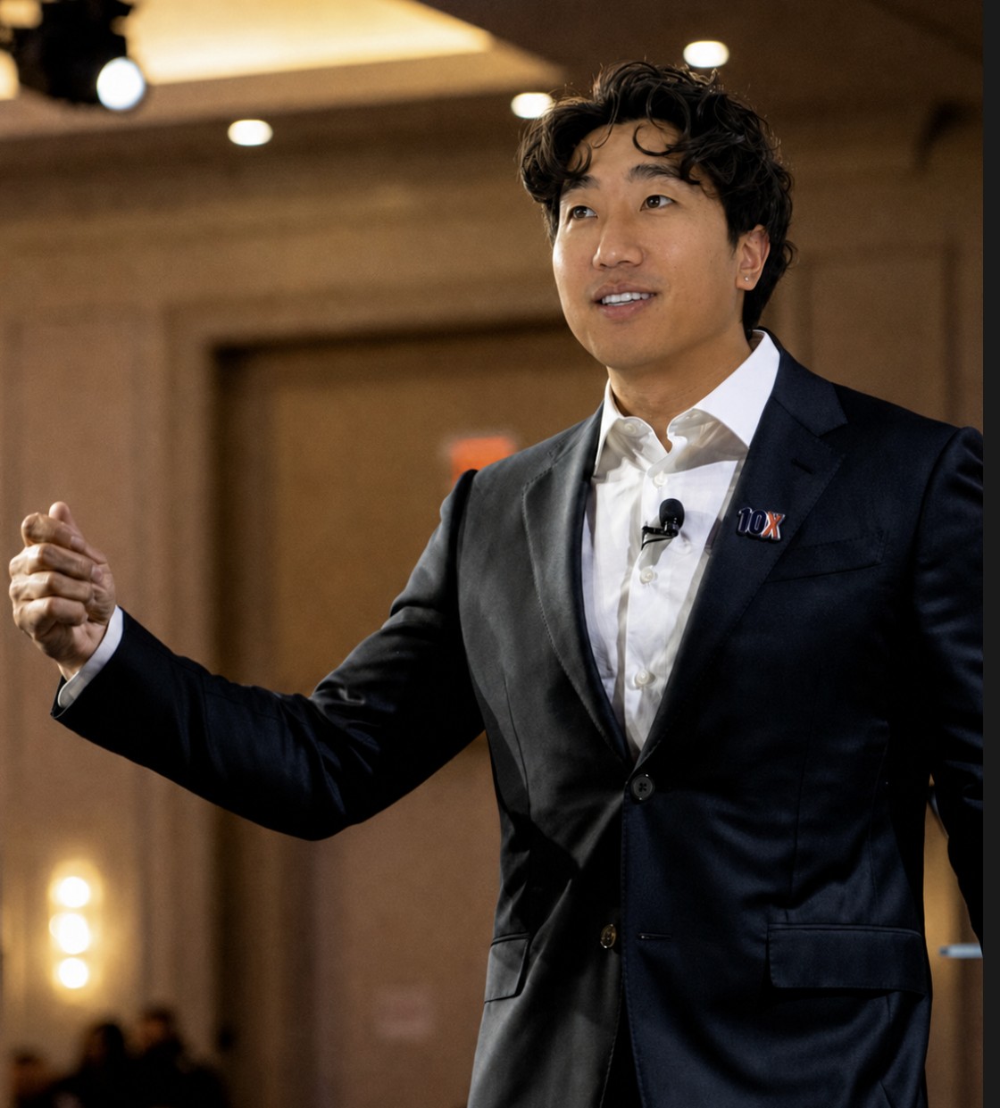 Jake Song speaking to a room of people
